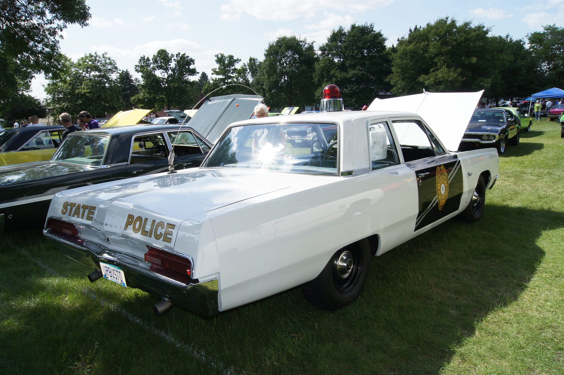 A 1967 Plymouth Fury I police cruiser of the exact type and model year used by American small-town police departments, representative of the patrol car Herbert Schirmer was driving on December 3, 1967